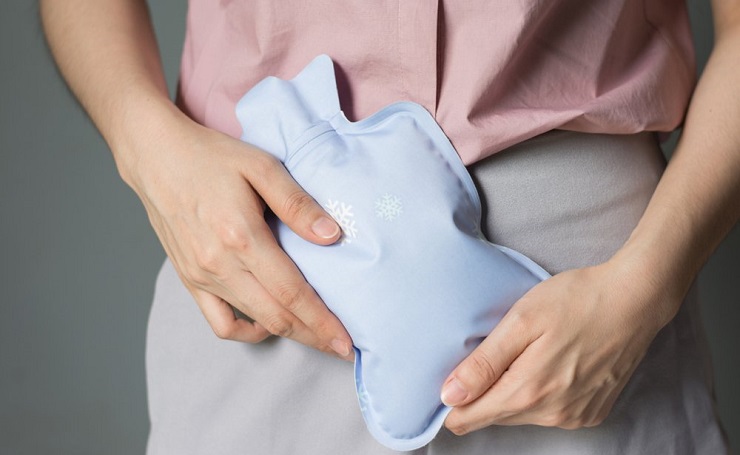 тепло к животу