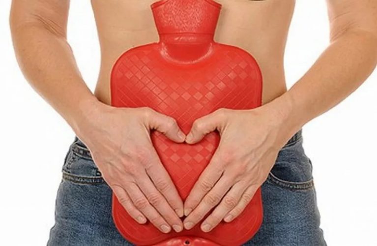 Грелка на животе